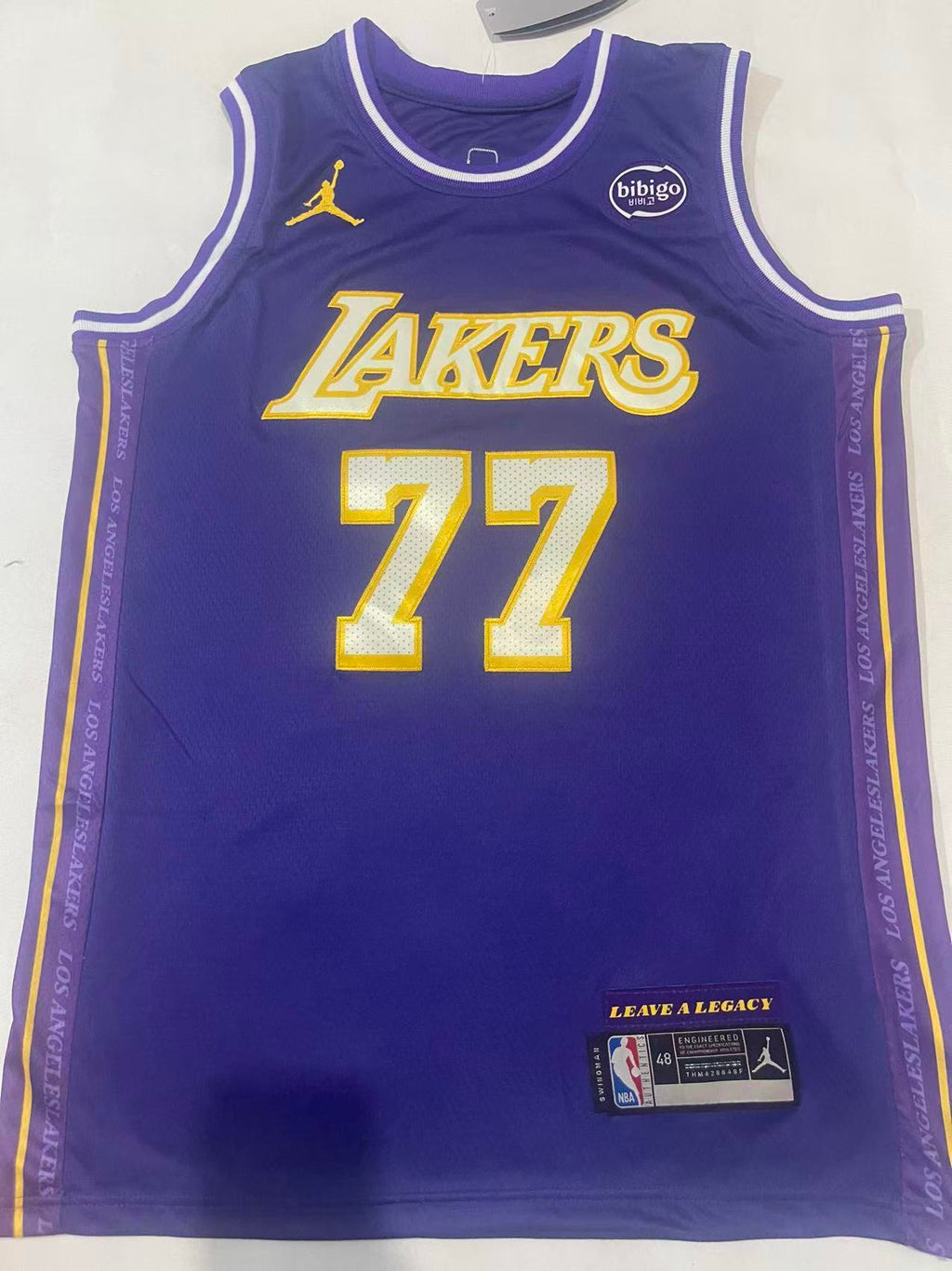 Luka Dončić #77 Los Angeles Lakers Statement Edition Swingman Jersey – Purple